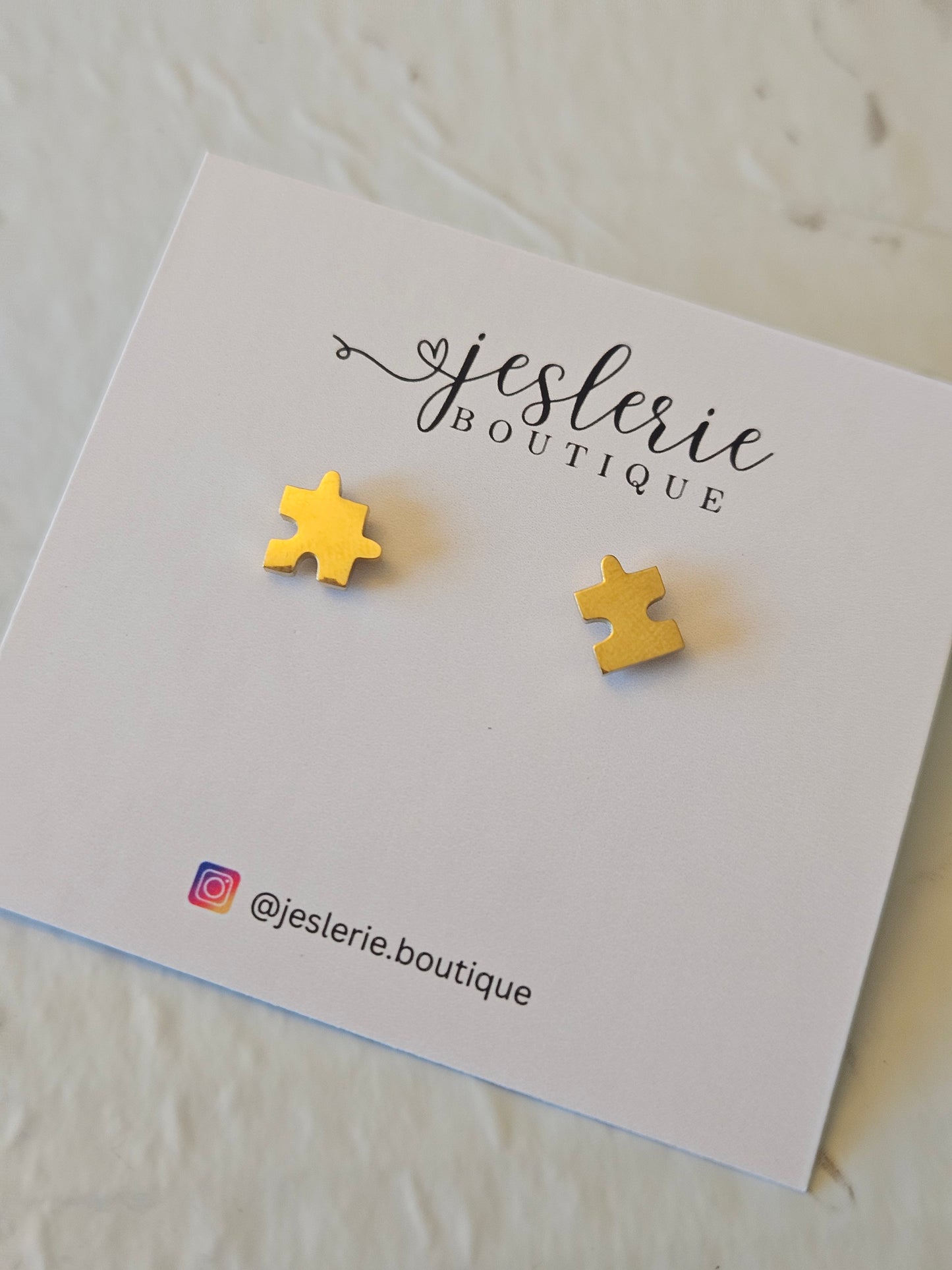 Mini stud puzzle earrings